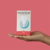 Hand holding mooncup box