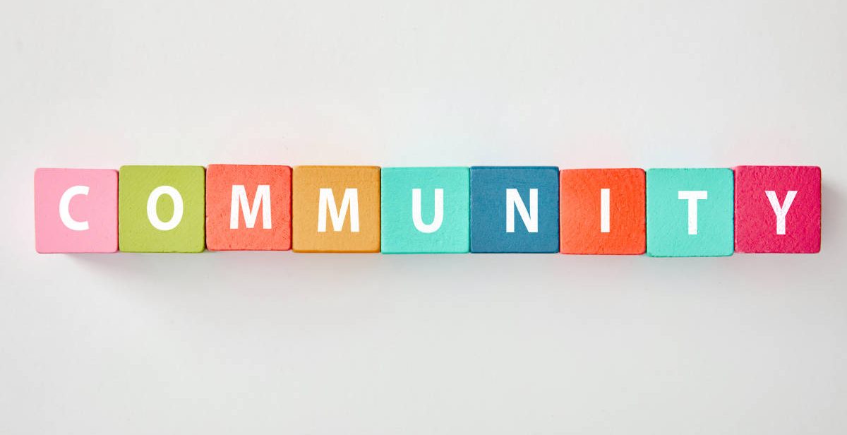 Community written on toy blocks