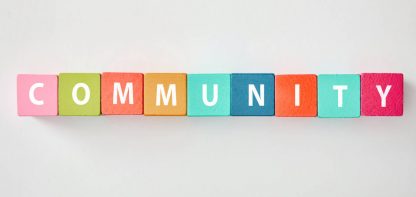 Community written on toy blocks
