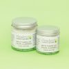 Two vegan beauty products in glass jars