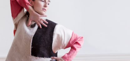 Woman with bio-plastic buttons