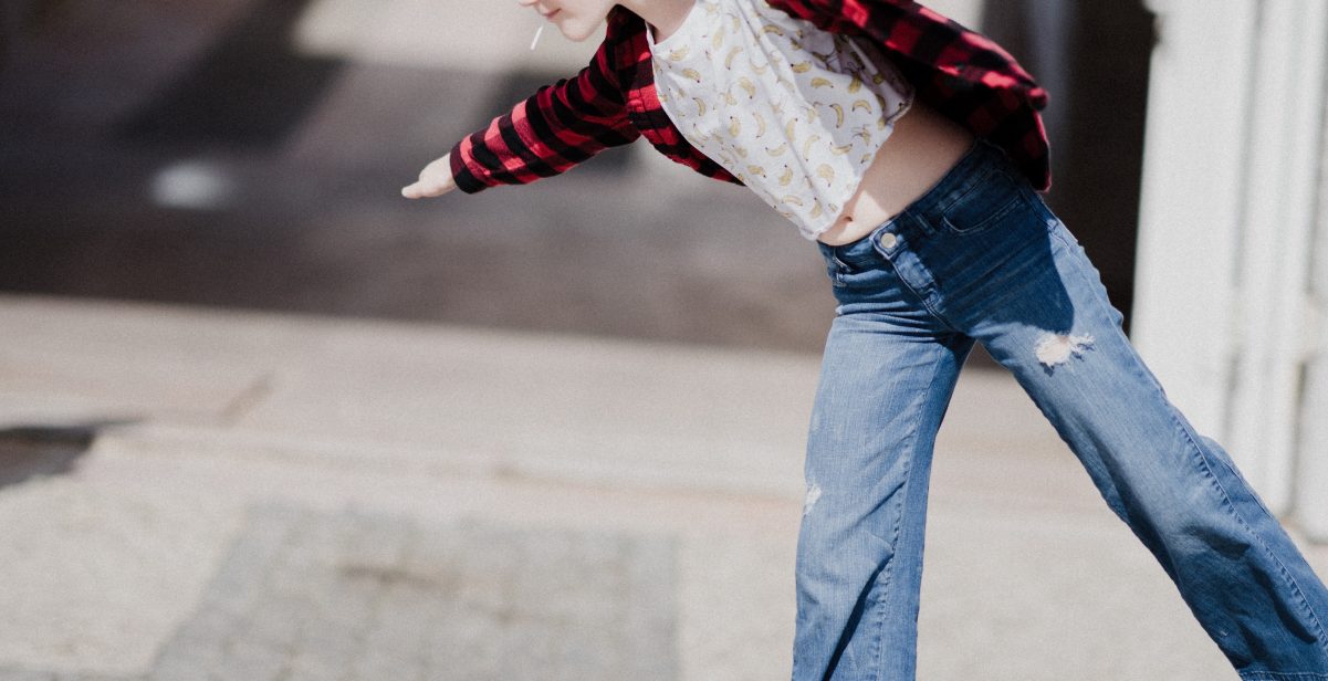 Girl standing on one leg