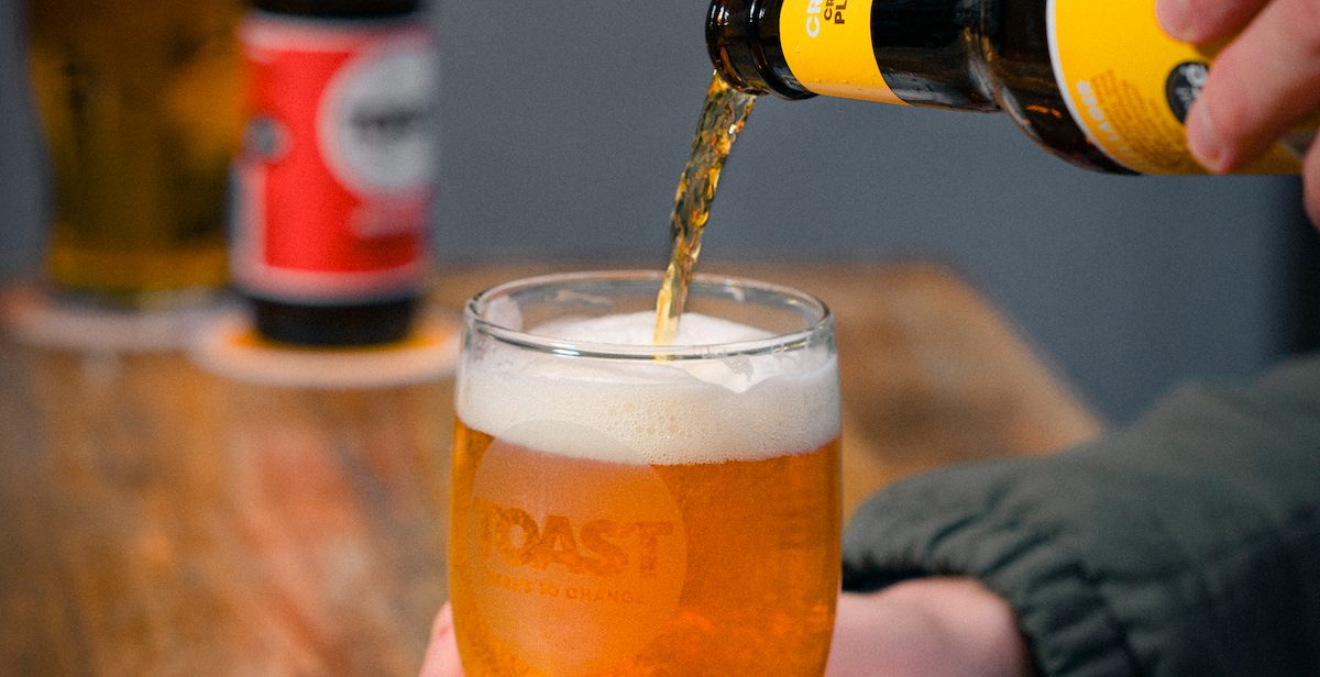 Beer being poured into glass