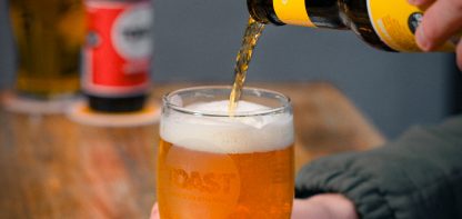 Beer being poured into glass