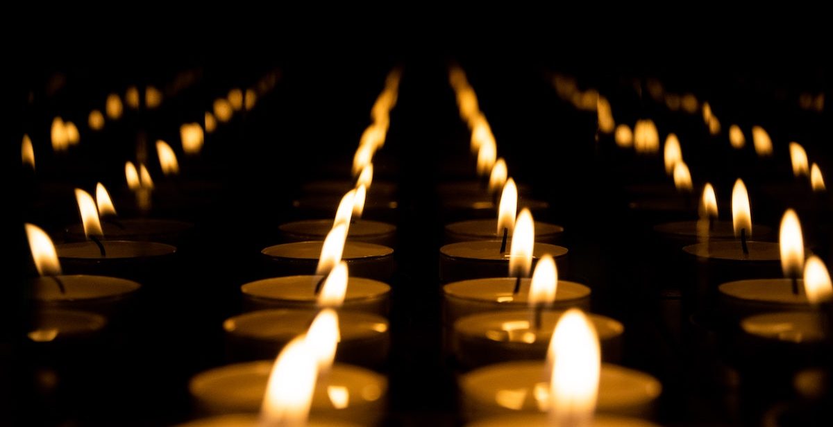 Rows of candle flames