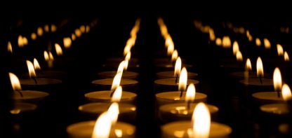 Rows of candle flames