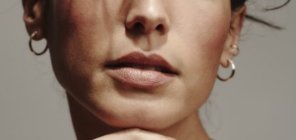 Woman wearing gold jewellery