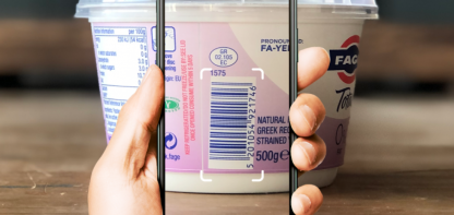 Phone scanning a yogurt pot barcode