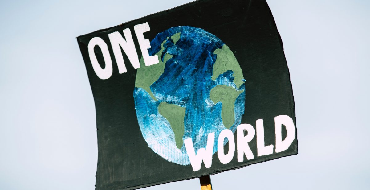 Poster saying 'one world'