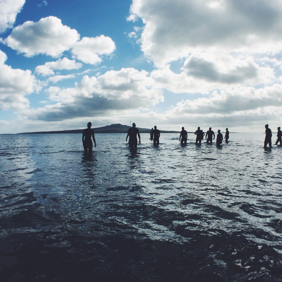 Men bathing in the sea